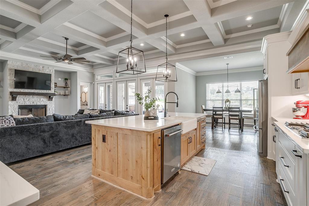 2161 Eagles Rdg Drive Weatherford, TX 76087 - Photo 15 of 40 a kitchen with stainless steel appliances granite countertop a stove and cabinets