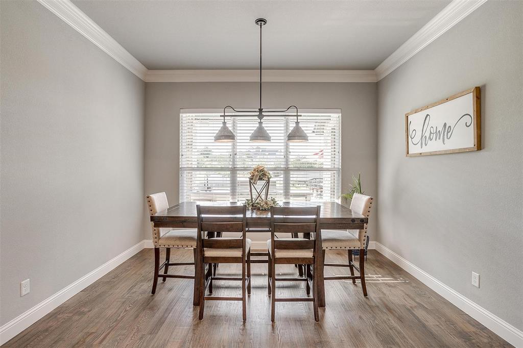 2161 Eagles Rdg Drive Weatherford, TX 76087 - Photo 17 of 40 a view of a dining room with furniture window and wooden floor