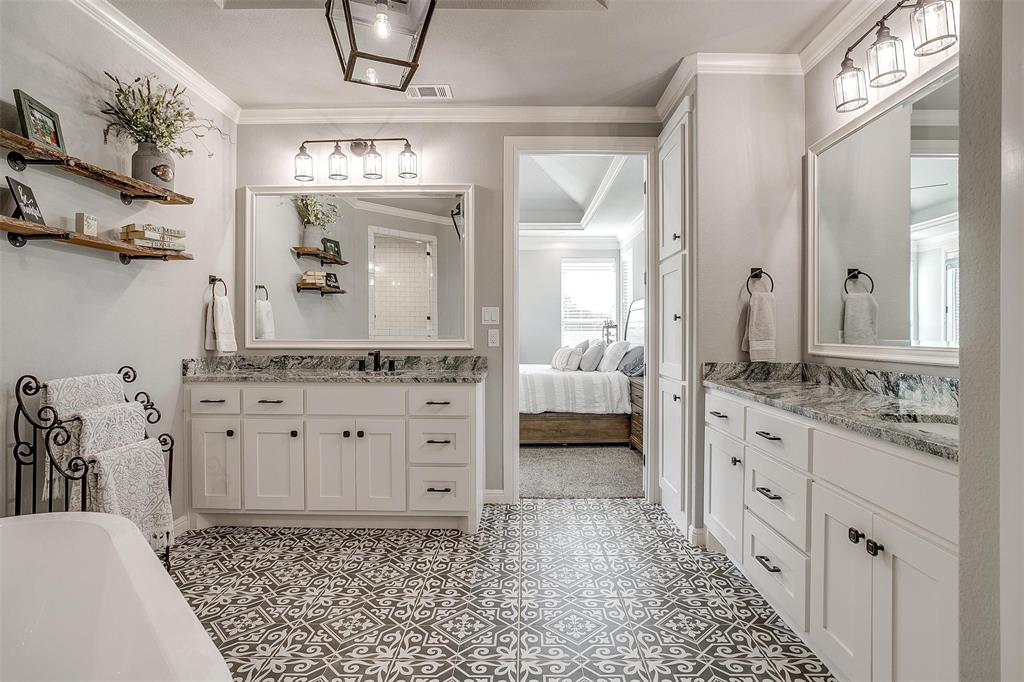 2161 Eagles Rdg Drive Weatherford, TX 76087 - Photo 20 of 40 a bathroom with a double vanity sink and a mirror