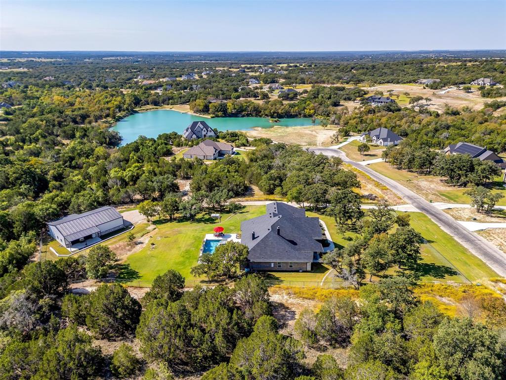 2161 Eagles Rdg Drive Weatherford, TX 76087 - Photo 2 of 40 an aerial view of residential houses with outdoor space and swimming pool