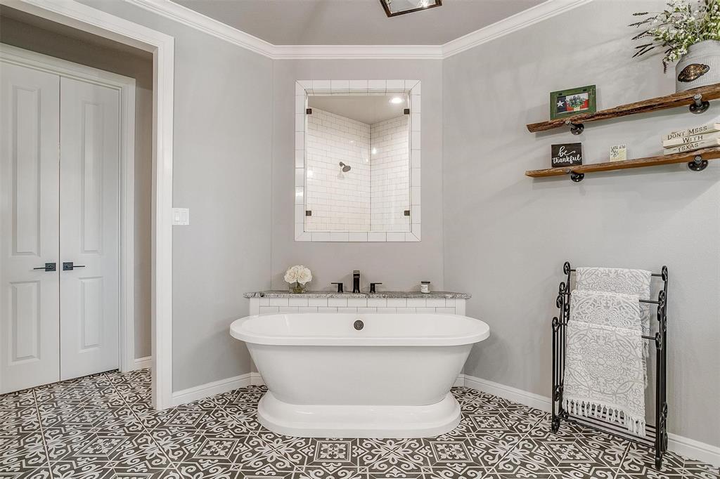 2161 Eagles Rdg Drive Weatherford, TX 76087 - Photo 21 of 40 a bathroom with a sink and a mirror
