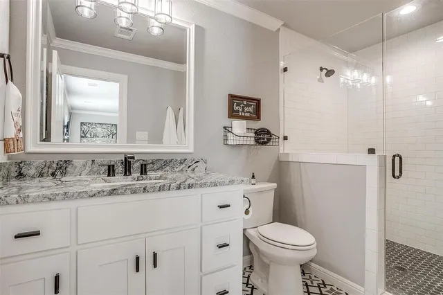 a view of a workspace with a bookshelf