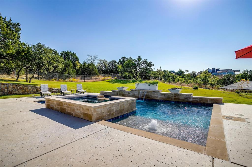 2161 Eagles Rdg Drive Weatherford, TX 76087 - Photo 35 of 40 a view of a swimming pool with a lounge chair and swimming pool