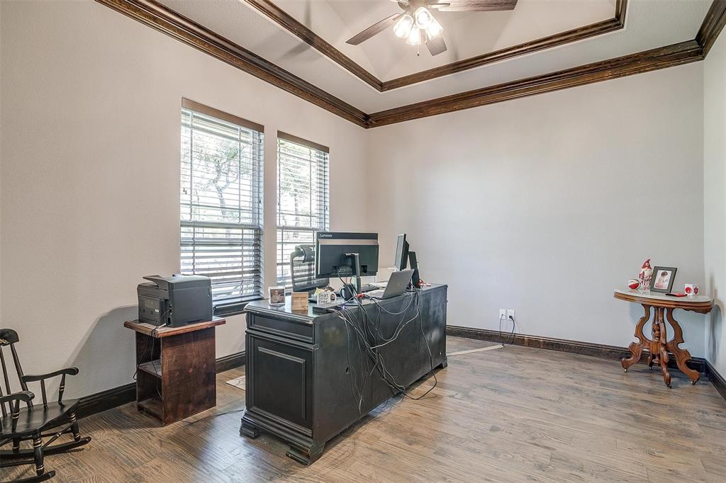 2161 Eagles Rdg Drive Weatherford, TX 76087 - Photo 8 of 40 a living room with furniture and a flat screen tv