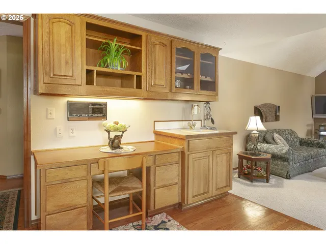 a utility room with sink dryer and washer