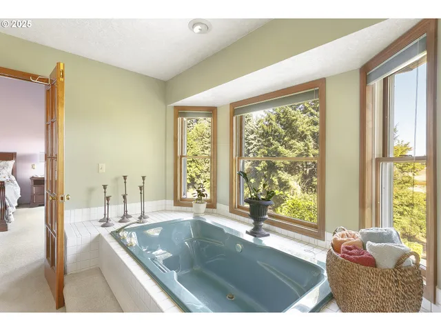 a view of a living room and a large window