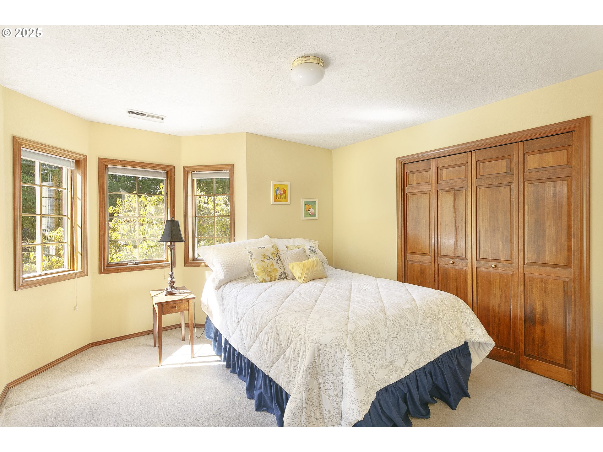 5400 Southeast Chase Road Gresham, OR 97080 - Photo 24 of 47 a bedroom with a bed and a window