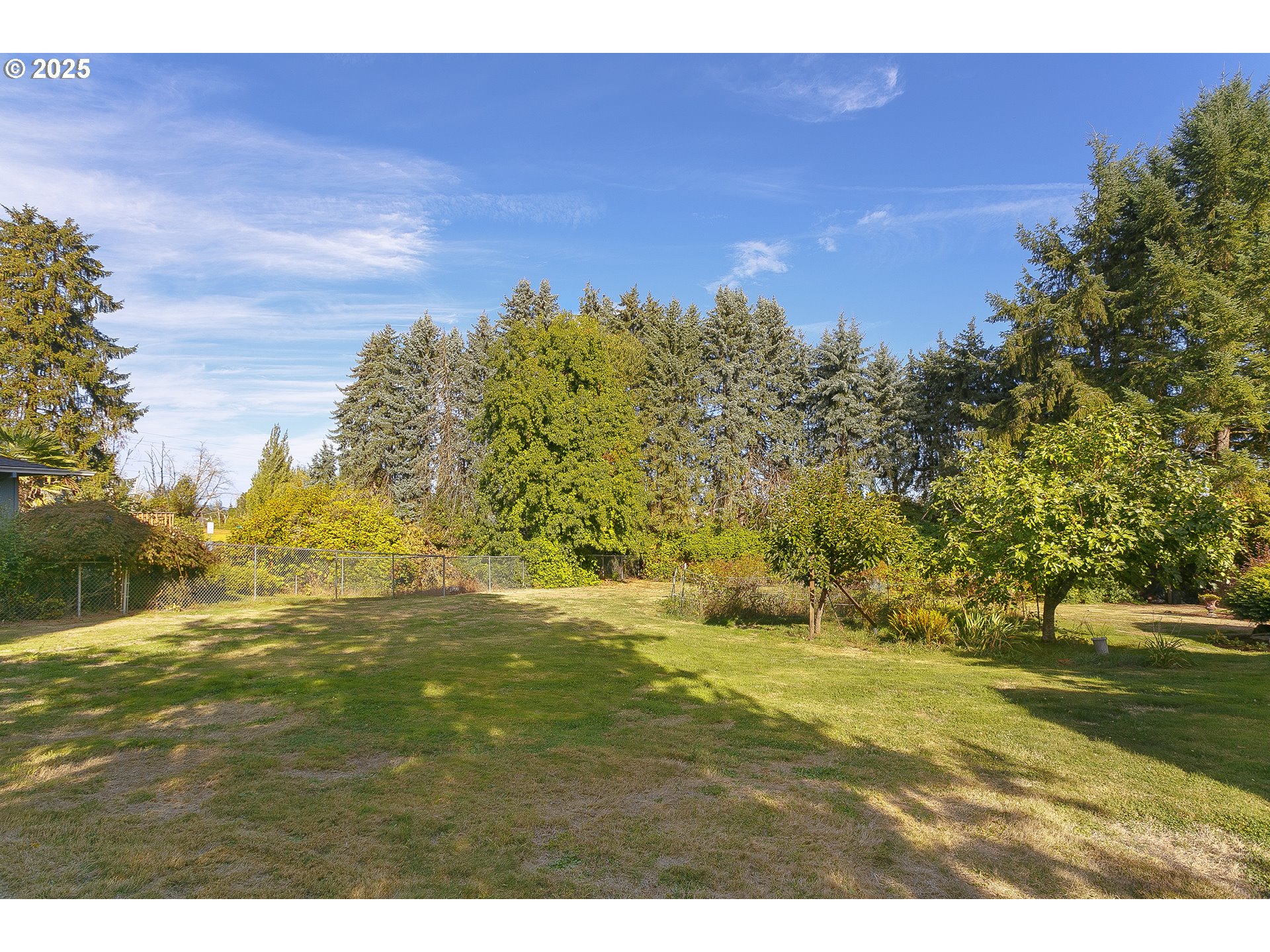 5400 Southeast Chase Road Gresham, OR 97080 - Photo 40 of 47 a view of a yard with an ocean
