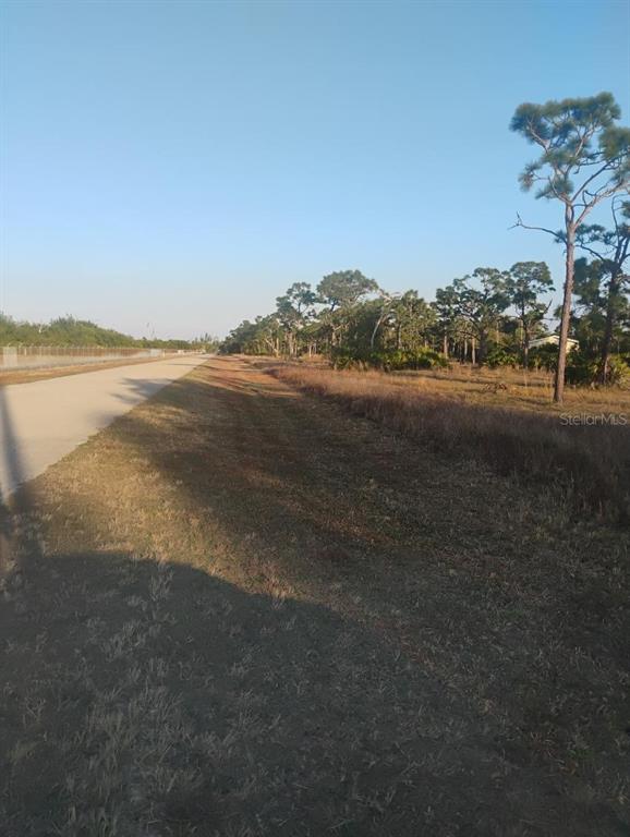 6820 Stringfellow Road St. James City, FL 33956 - Photo 4 of 4 a view of an ocean and a mountain