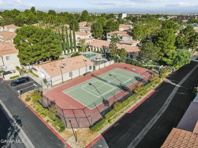an aerial view of a tennis ground