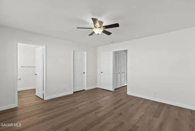 a bathroom with a sink a toilet and vanity
