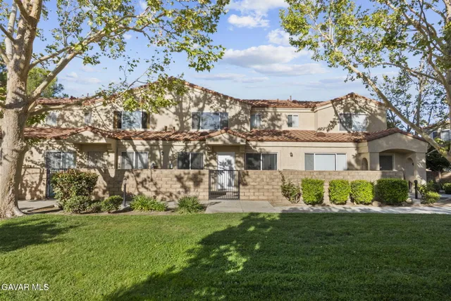 a view of a house with a garden