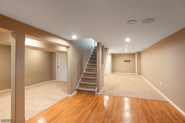 a view of a hallway with stairs