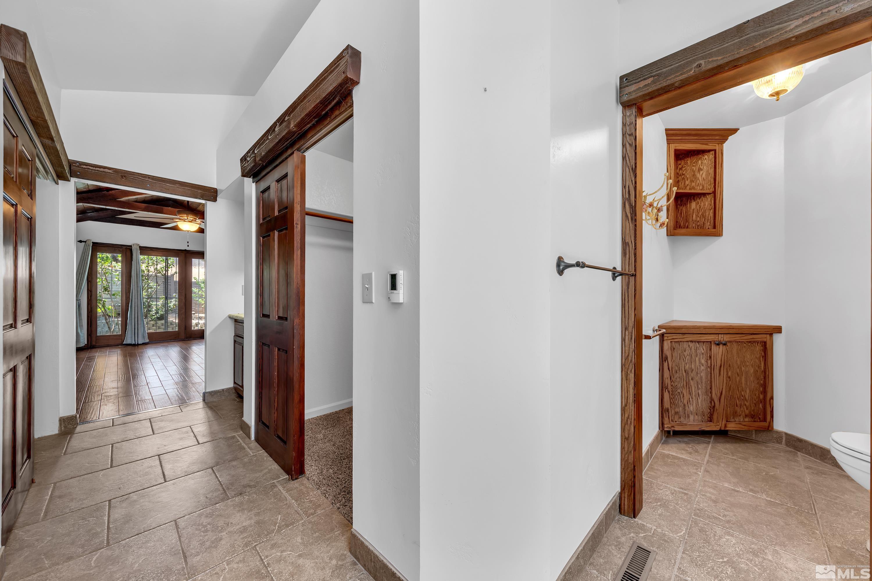 3336 Spring Creek Circle Reno, NV 89509 - Photo 23 of 36 a view of a hallway with closet and livingroom