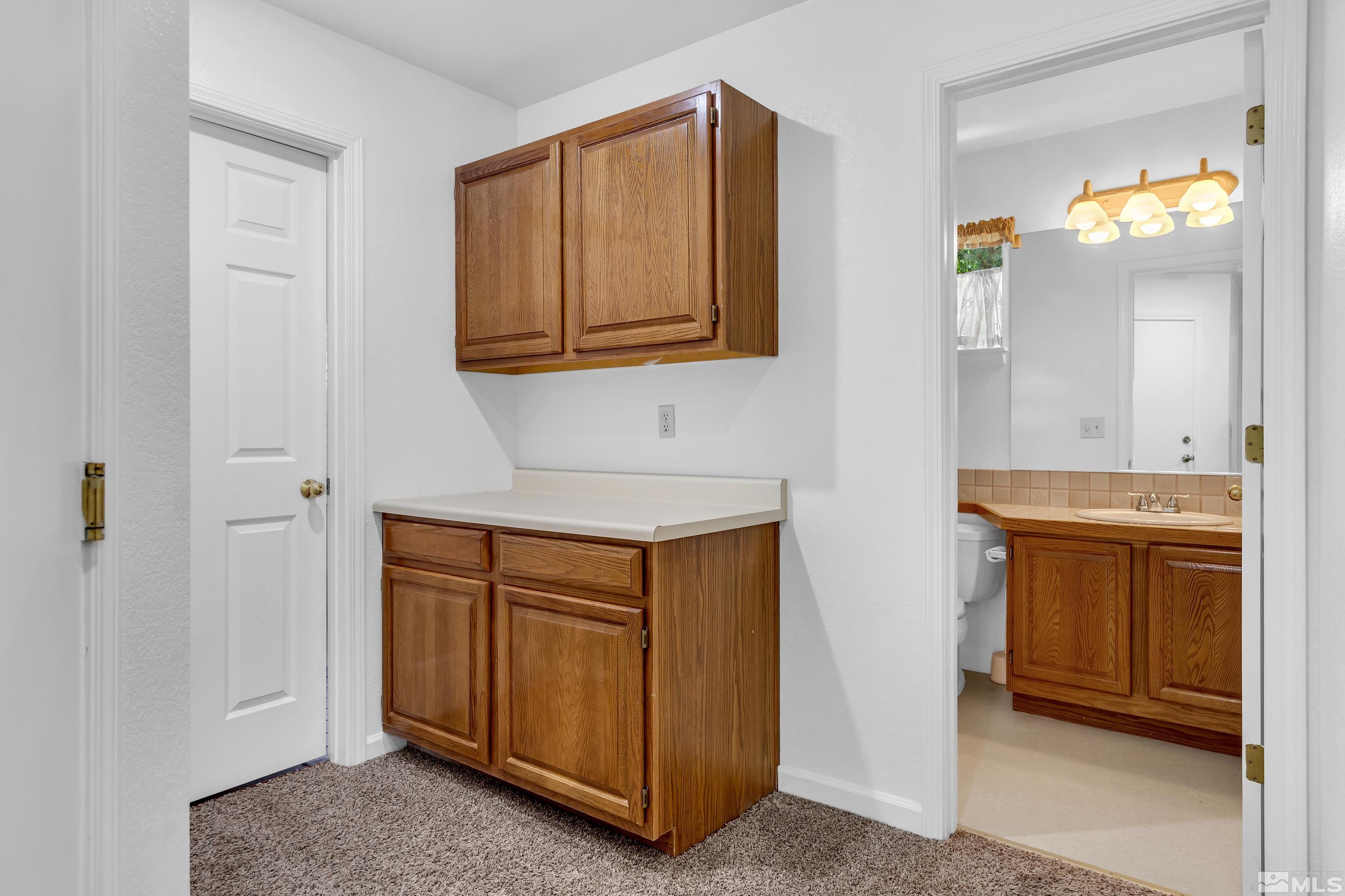 3336 Spring Creek Circle Reno, NV 89509 - Photo 26 of 36 a view of cabinets and a kitchen