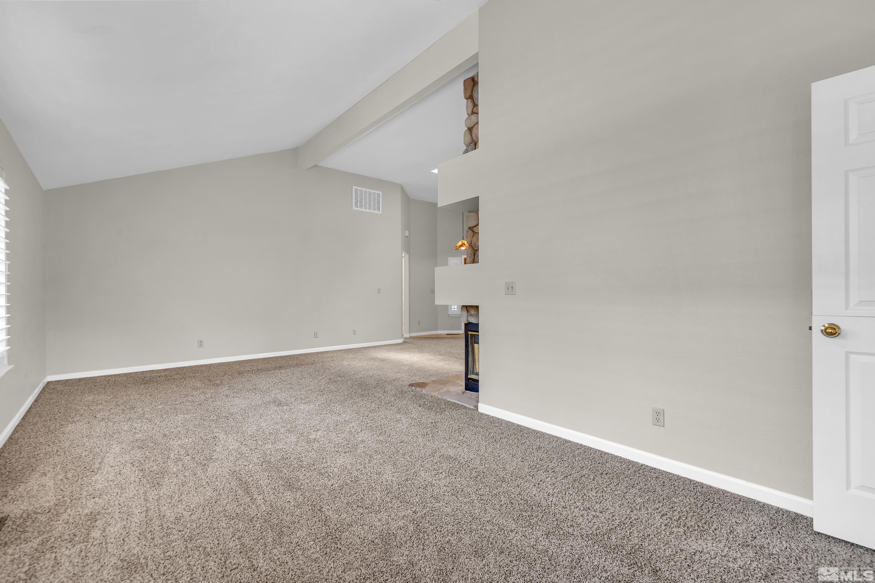 3336 Spring Creek Circle Reno, NV 89509 - Photo 9 of 36 a view of a big room with a empty space