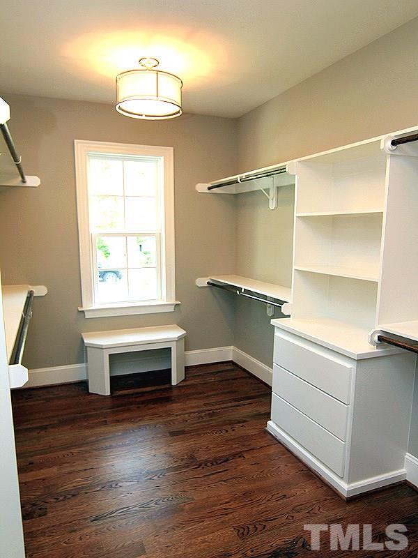 1304 Duplin Road Raleigh, NC 27607 - Photo 19 of 25 a room with wooden floors and a window