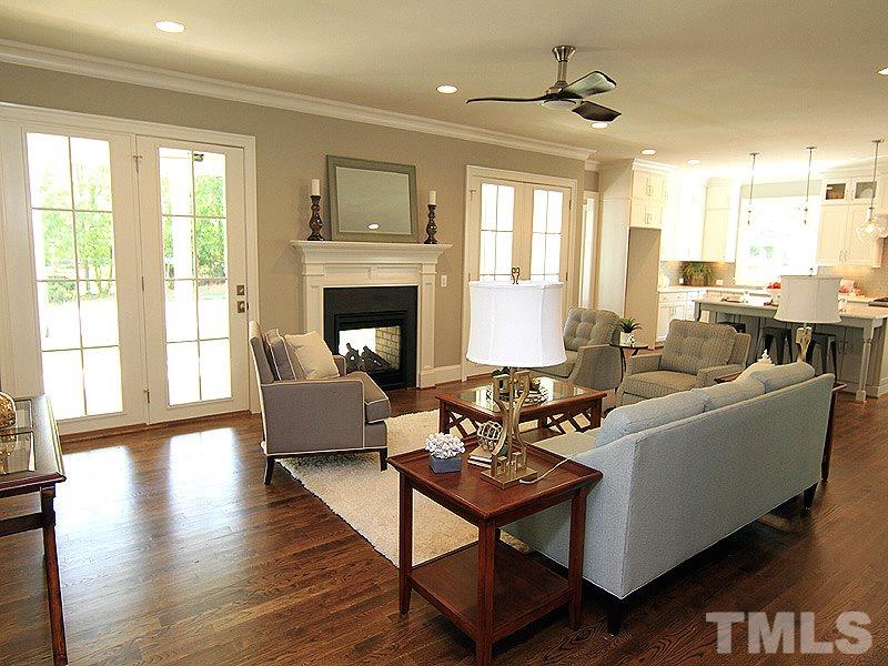 1304 Duplin Road Raleigh, NC 27607 - Photo 3 of 25 a living room with furniture fireplace and a large window