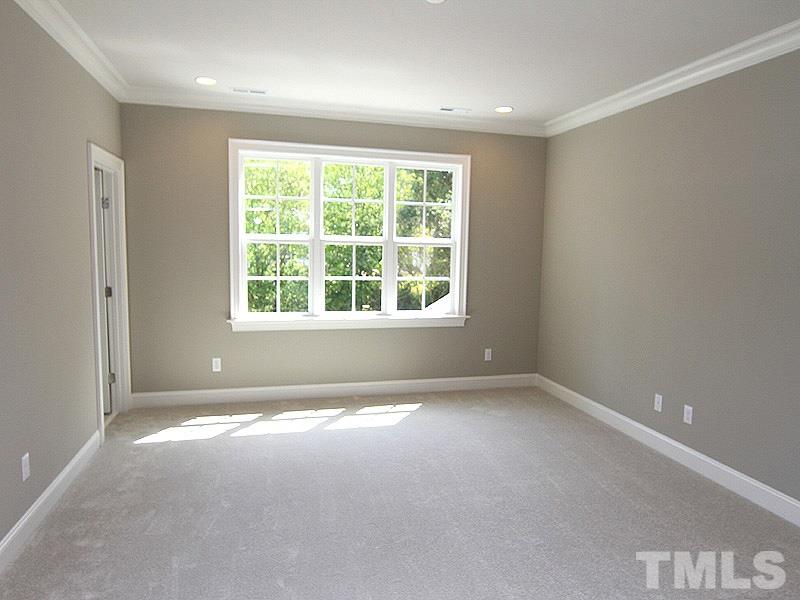 1304 Duplin Road Raleigh, NC 27607 - Photo 21 of 25 an empty room with a window