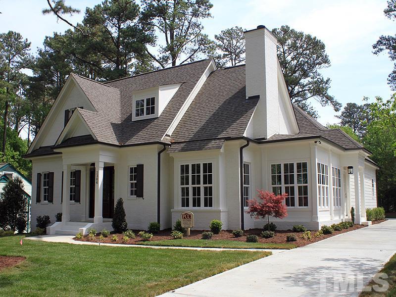 1304 Duplin Road Raleigh, NC 27607 - Photo 25 of 25 a front view of a house with a yard