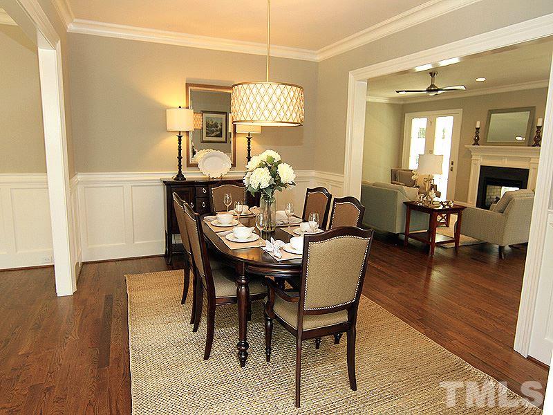 1304 Duplin Road Raleigh, NC 27607 - Photo 7 of 25 a view of a dining room with furniture and wooden floor