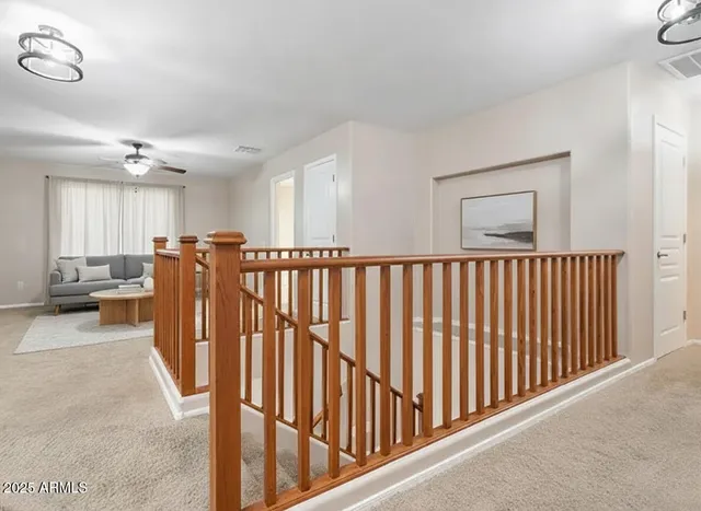 a view of a hallway with a furniture
