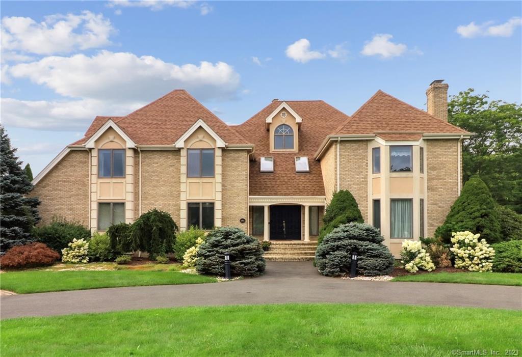 144 Winding Brook Farm Road Watertown, CT 06795 - Photo 1 of 1 a front view of a house with a yard and porch