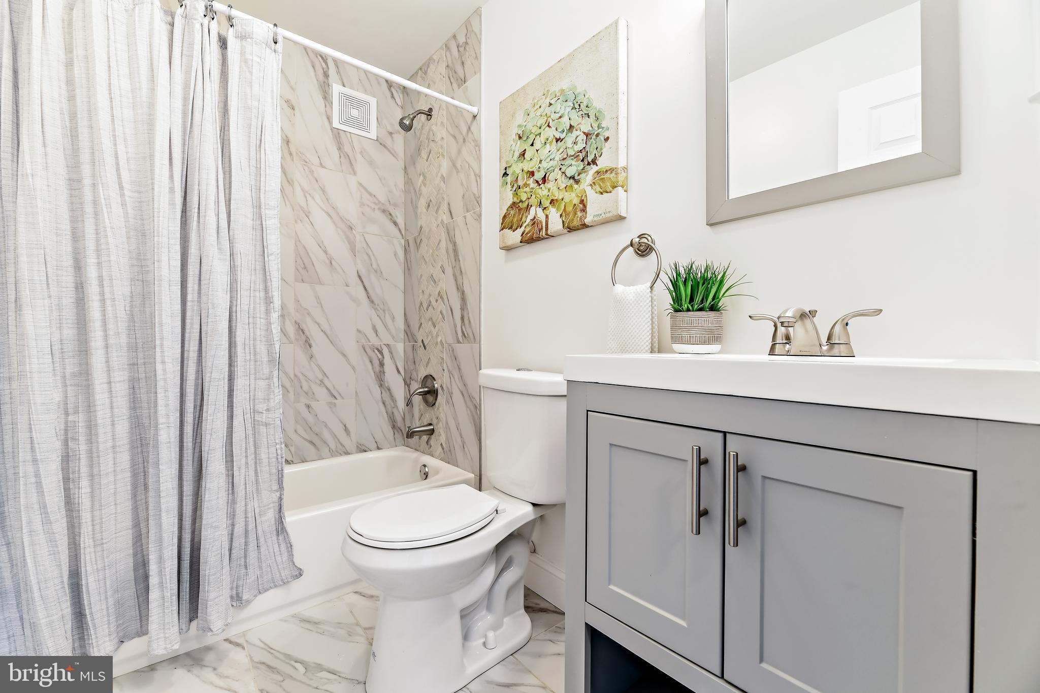 8229 Peach Orchard Road Baltimore, MD 21222 - Photo 34 of 43 Updated Main Floor Bathroom