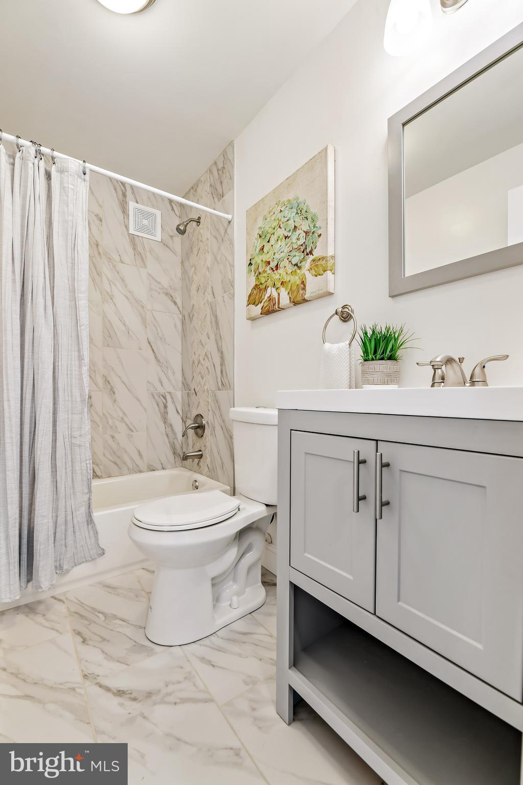8229 Peach Orchard Road Baltimore, MD 21222 - Photo 35 of 43 Main Floor Bathroom