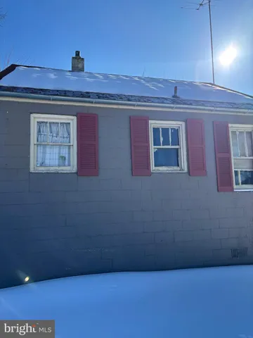 a view of a hallway with washer and dryer