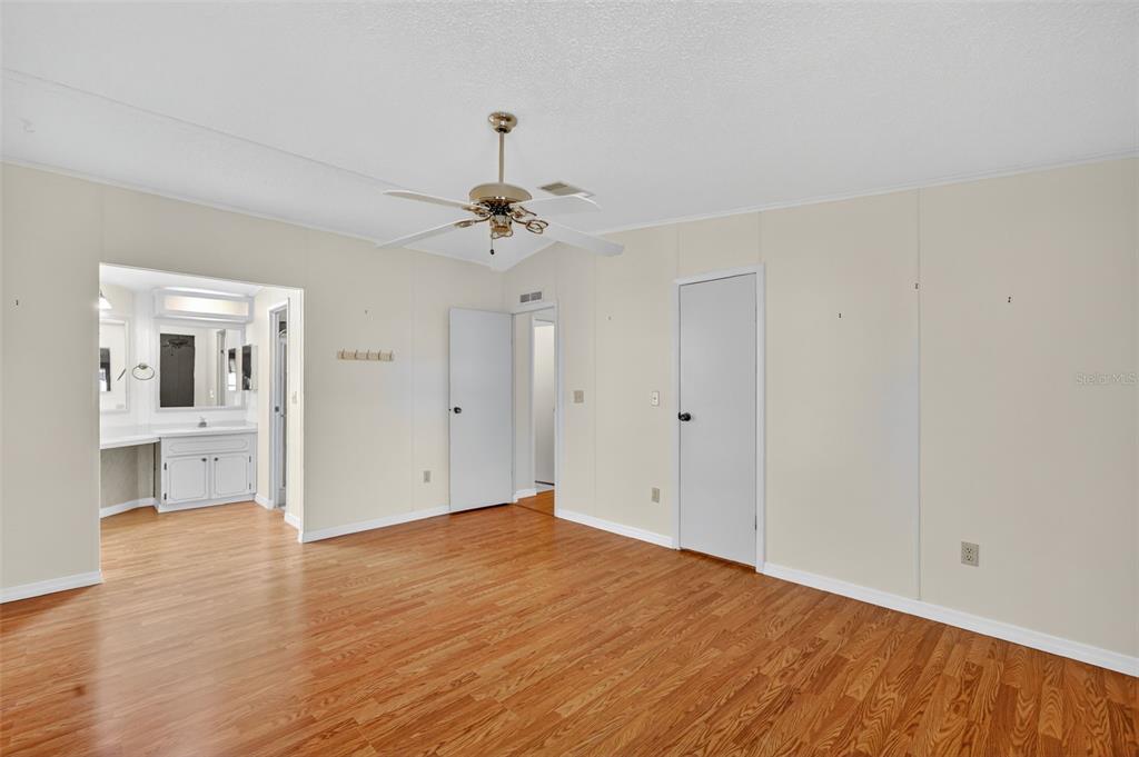 3324 Myakka River Road Tavares, FL 32778 - Photo 12 of 35 a view of empty room with wooden floor