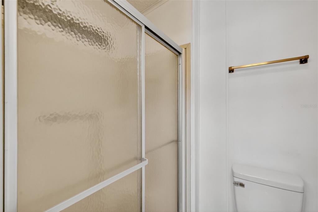 3324 Myakka River Road Tavares, FL 32778 - Photo 19 of 35 a bathroom with a shower