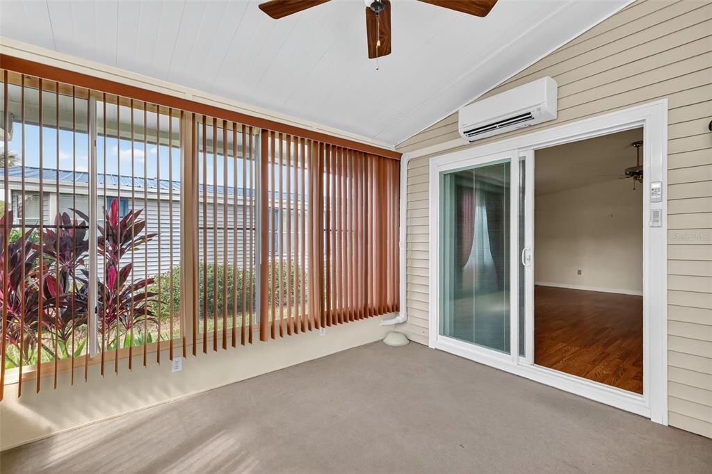 3324 Myakka River Road Tavares, FL 32778 - Photo 24 of 35 a view of a hallway with a window