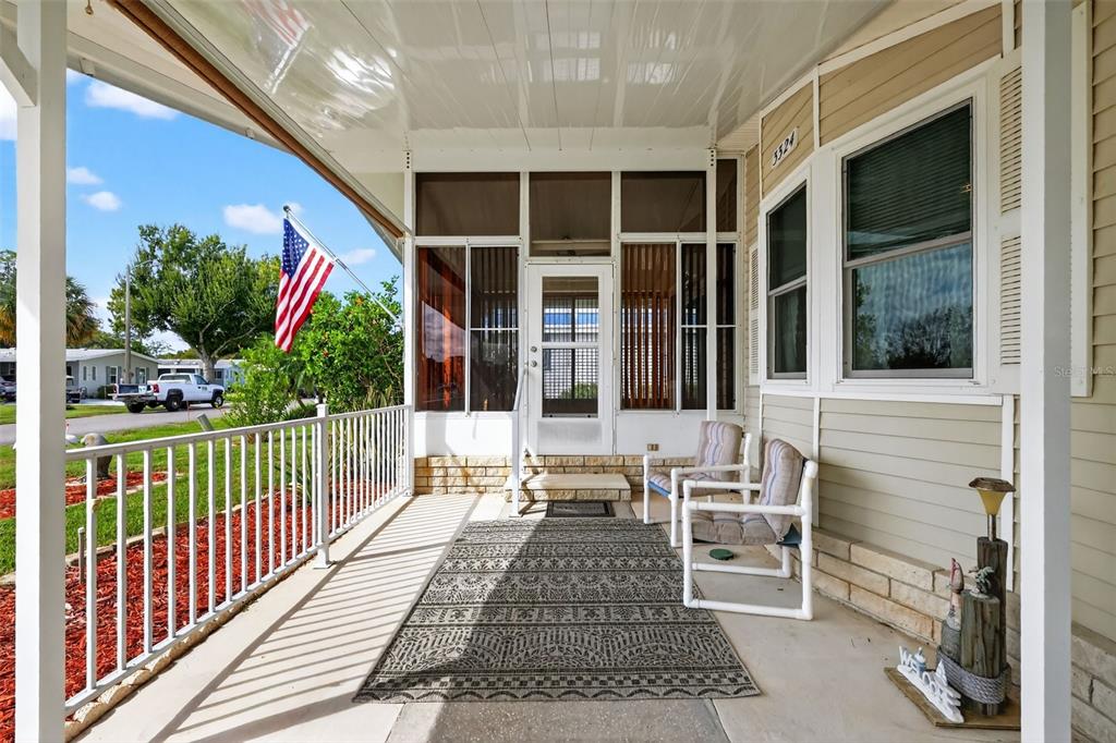 3324 Myakka River Road Tavares, FL 32778 - Photo 3 of 35 a balcony with furniture and flowers
