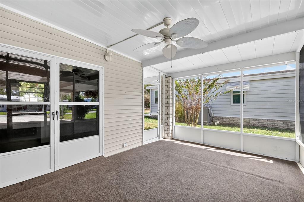 3324 Myakka River Road Tavares, FL 32778 - Photo 4 of 35 a view of an empty room with a window