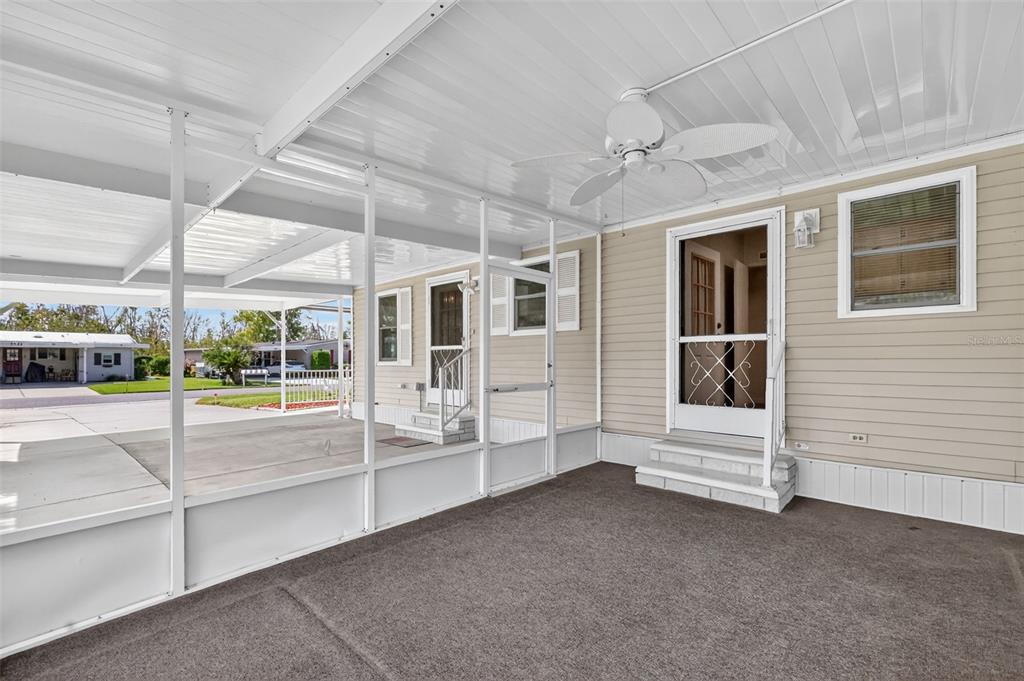 3324 Myakka River Road Tavares, FL 32778 - Photo 7 of 35 a view of front door with outdoor living space