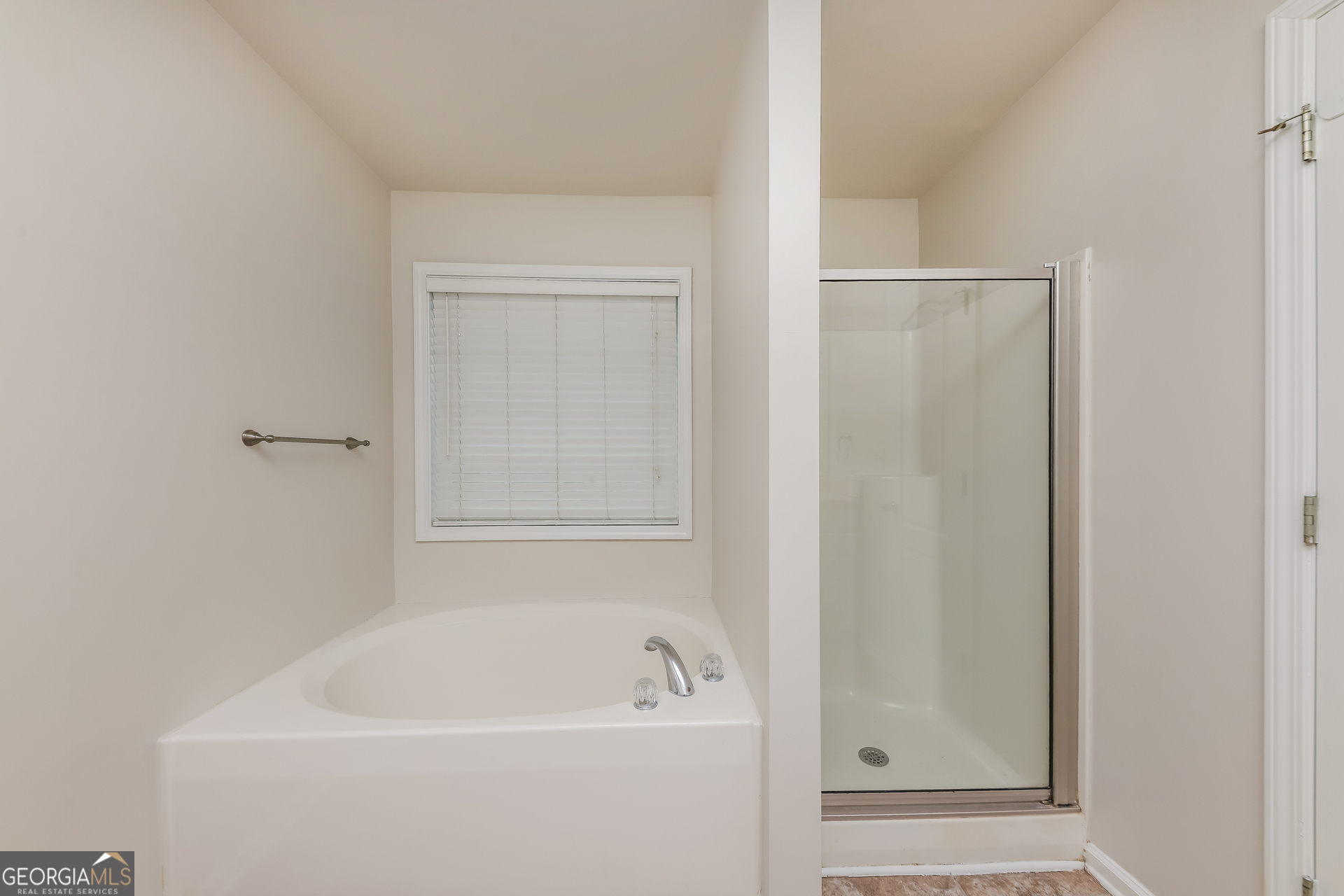 102 Rocky Branch Way Villa Rica, GA 30180 - Photo 9 of 16 a white bath tub sitting next to a white sink