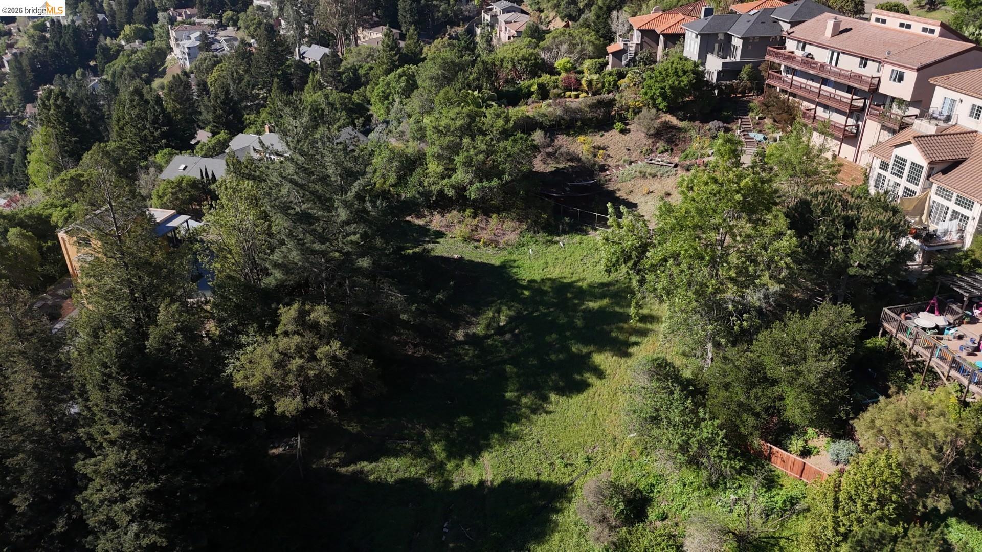 7135 Buckingham Boulevard Berkeley, CA 94705 - Photo 5 of 7 a view of outdoor space and a yard