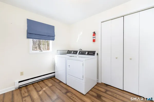 a utility room with dryer and washer