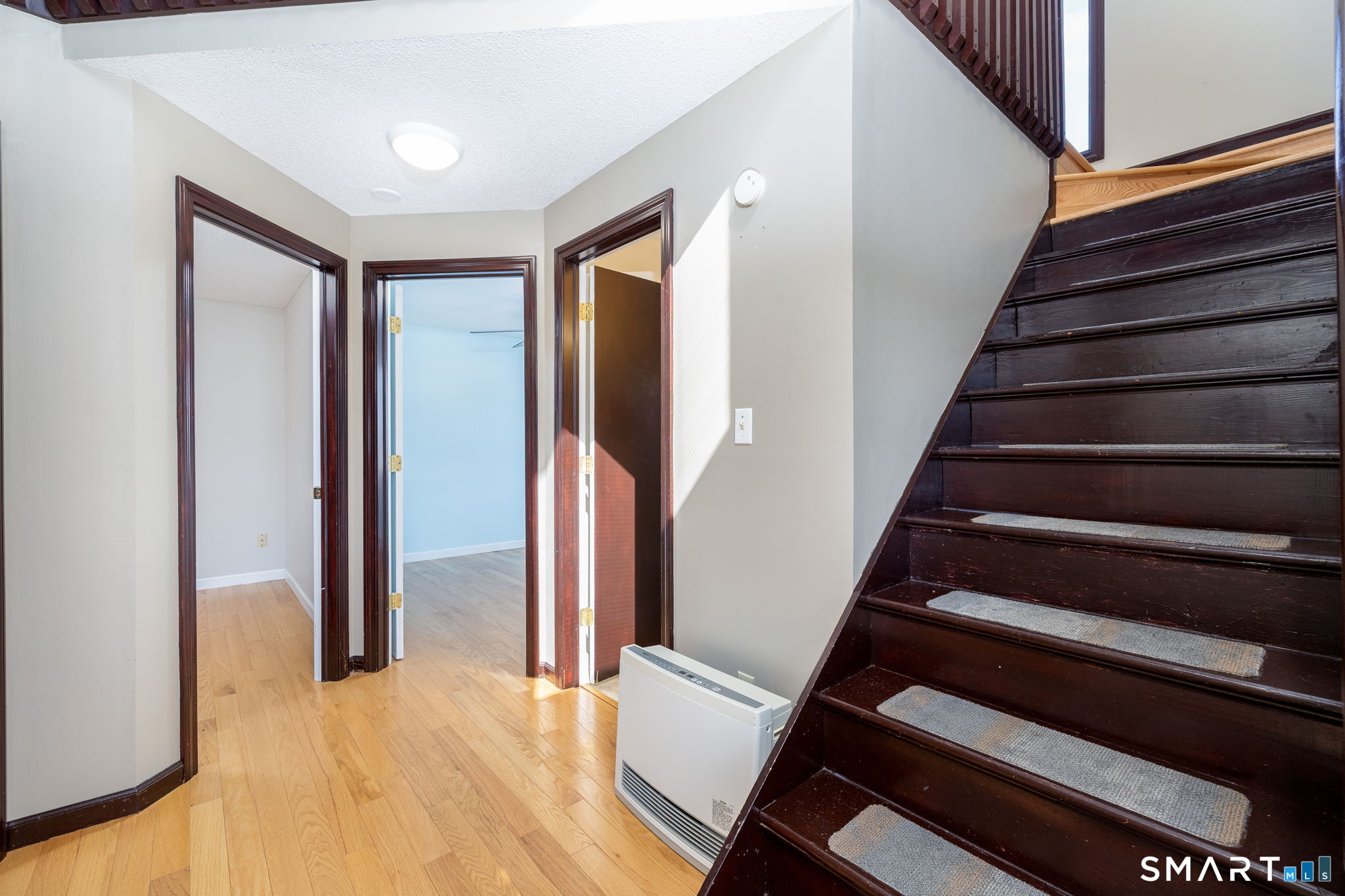 12 Rondaly Road Hebron, CT 06231 - Photo 25 of 33 a view of entryway with wooden floor and stairs