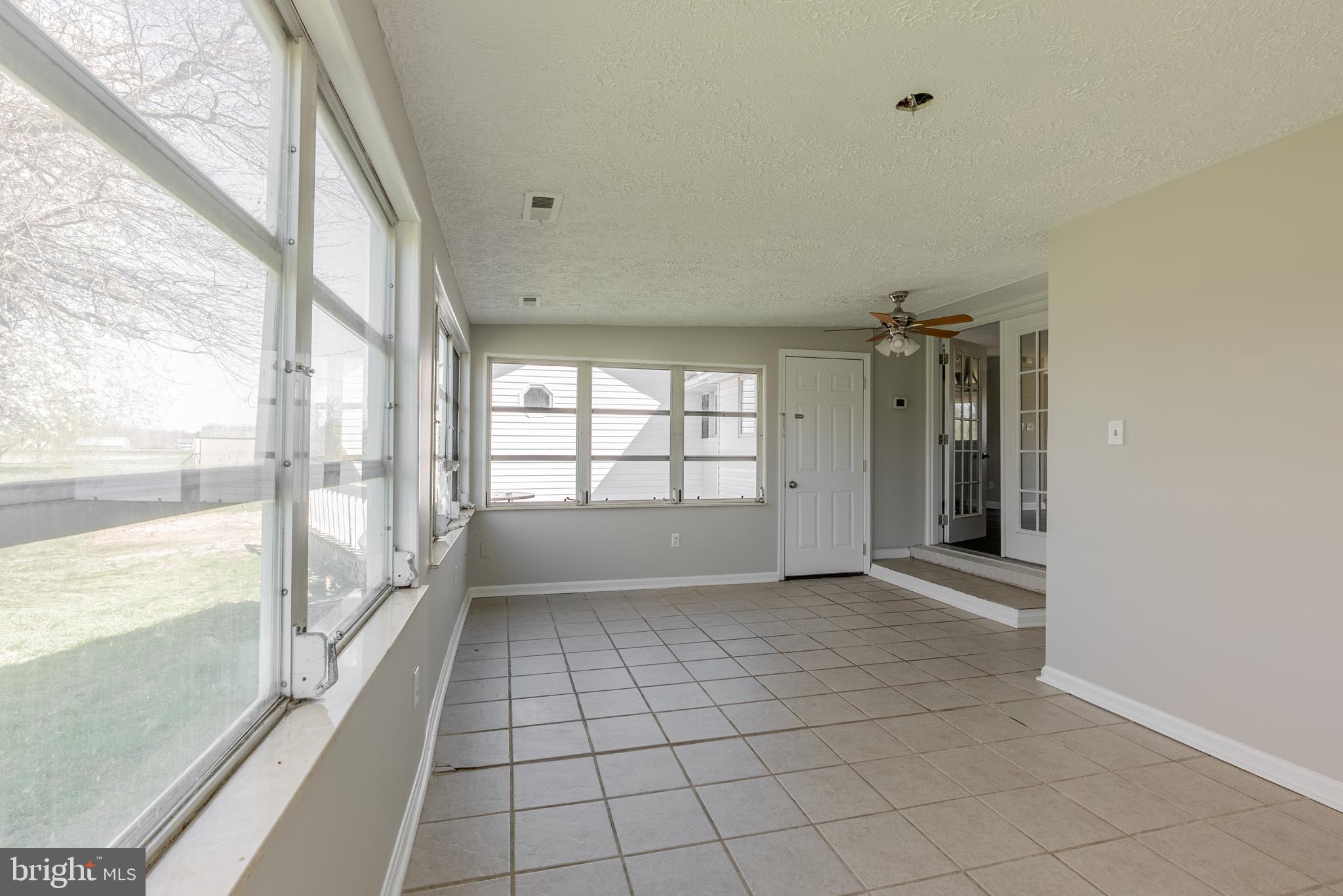 28405 Thompson Corner Road Mechanicsville, MD 20659 - Photo 10 of 29 Sunroom off the kitchen
