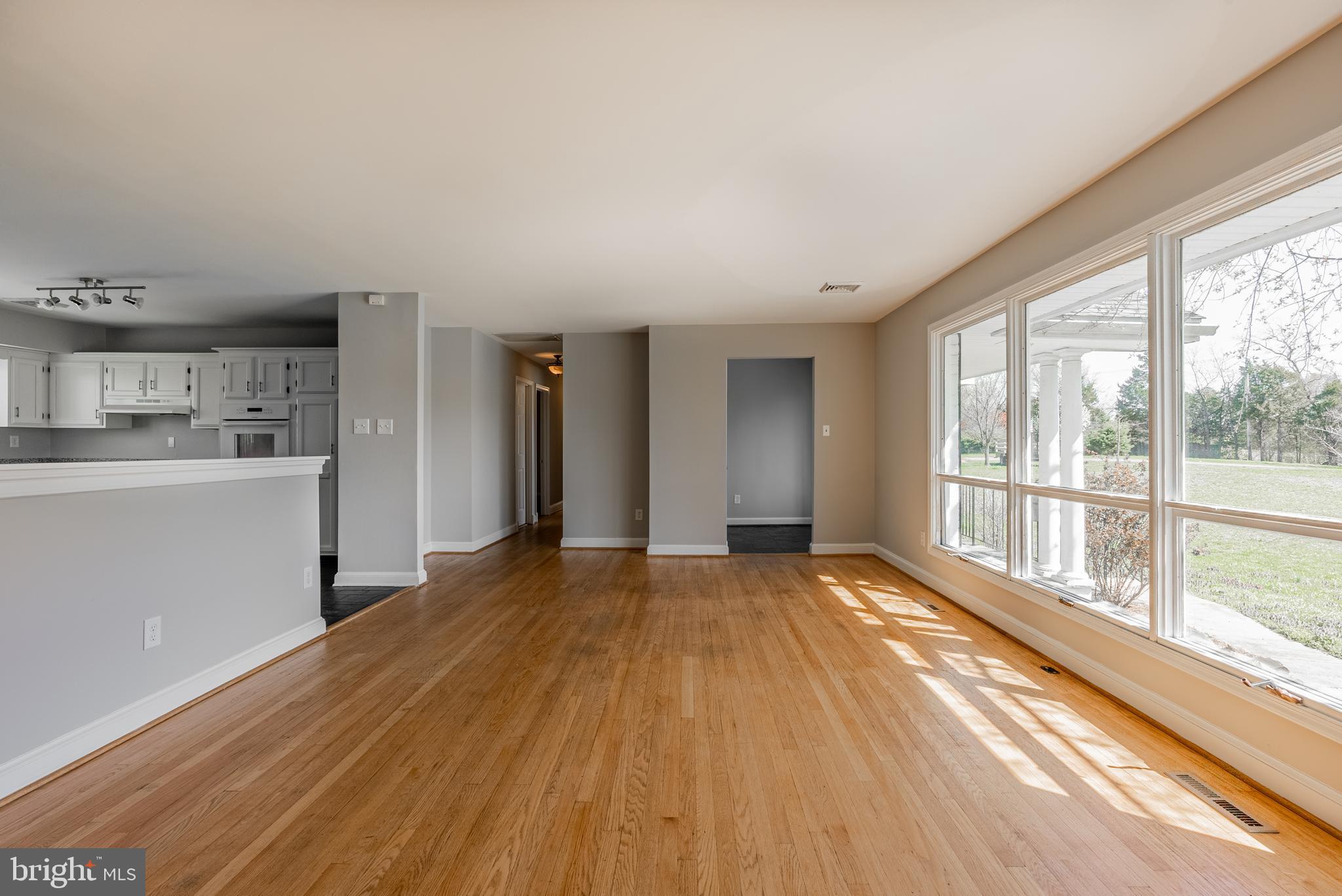 28405 Thompson Corner Road Mechanicsville, MD 20659 - Photo 4 of 29 Family room with hardwood floring
