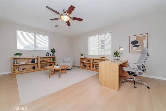 a large bathroom with a large tub and sink