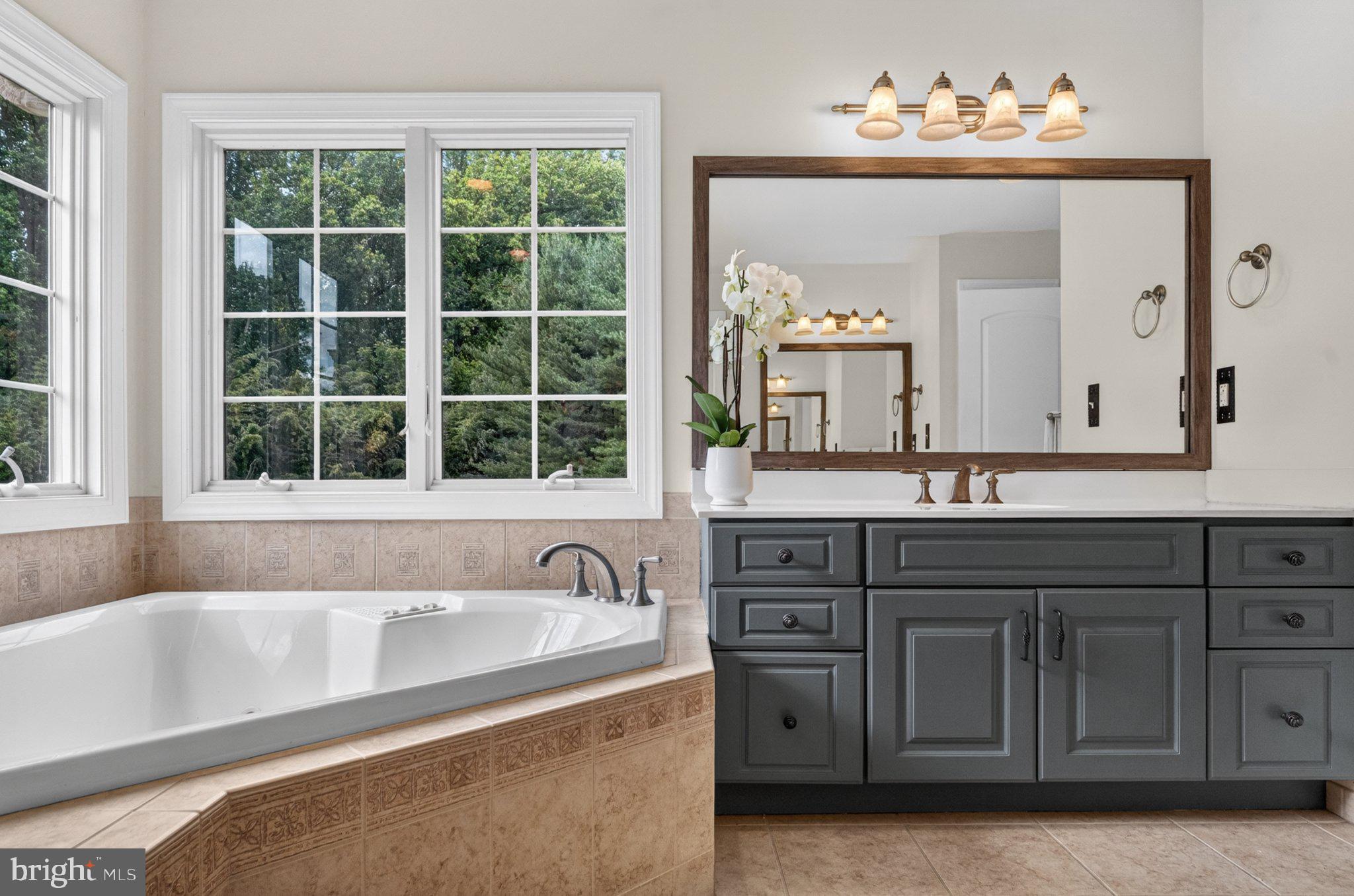 342 Ring Road Chadds Ford, PA 19317 - Photo 39 of 95 Serene bathroom with natural light.