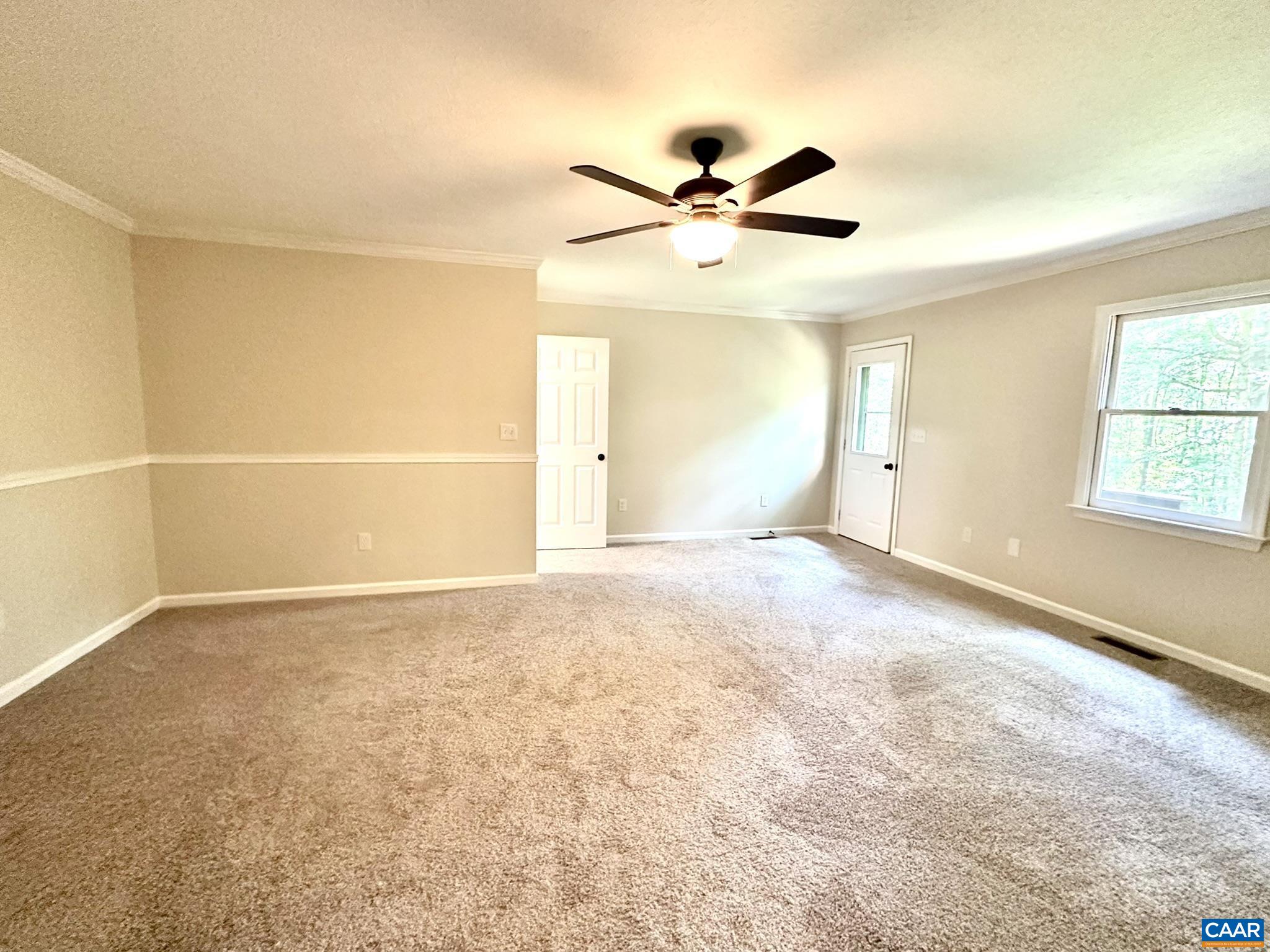439 Deer Drive Ruckersville, VA 22968 - Photo 22 of 44 Main level primary bedroom