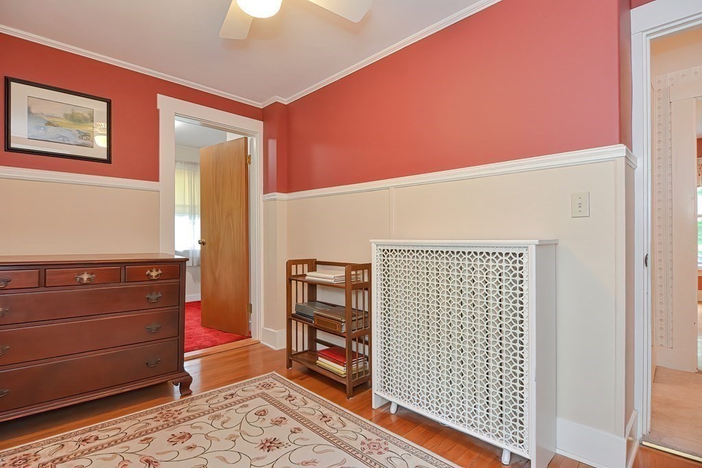 727 Main Street Woburn, MA 01801 - Photo 14 of 40 workspace with wooden floor cabinet and window