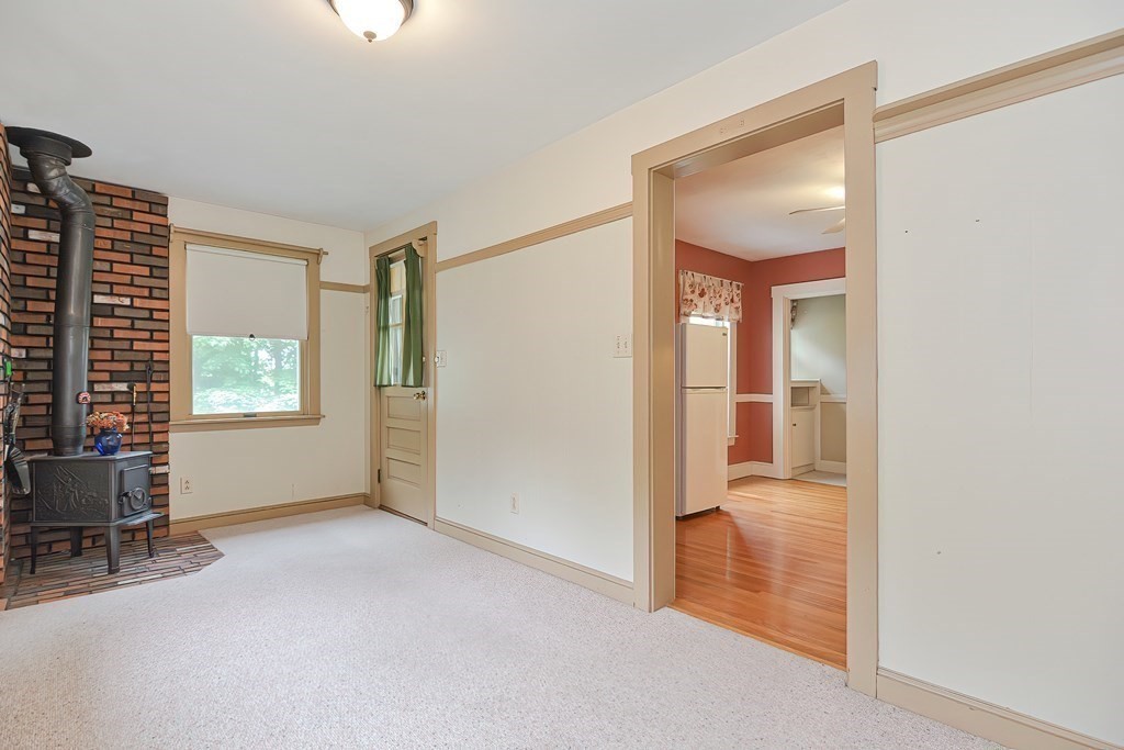 727 Main Street Woburn, MA 01801 - Photo 23 of 40 a view of livingroom with furniture and windows