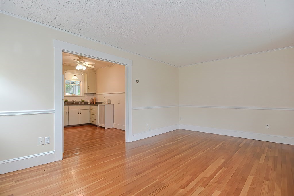 727 Main Street Woburn, MA 01801 - Photo 31 of 40 a view of a kitchen with wooden floor