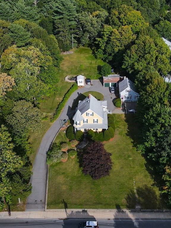 727 Main Street Woburn, MA 01801 - Photo 37 of 40 an aerial view of a house with a yard basket ball court and outdoor seating