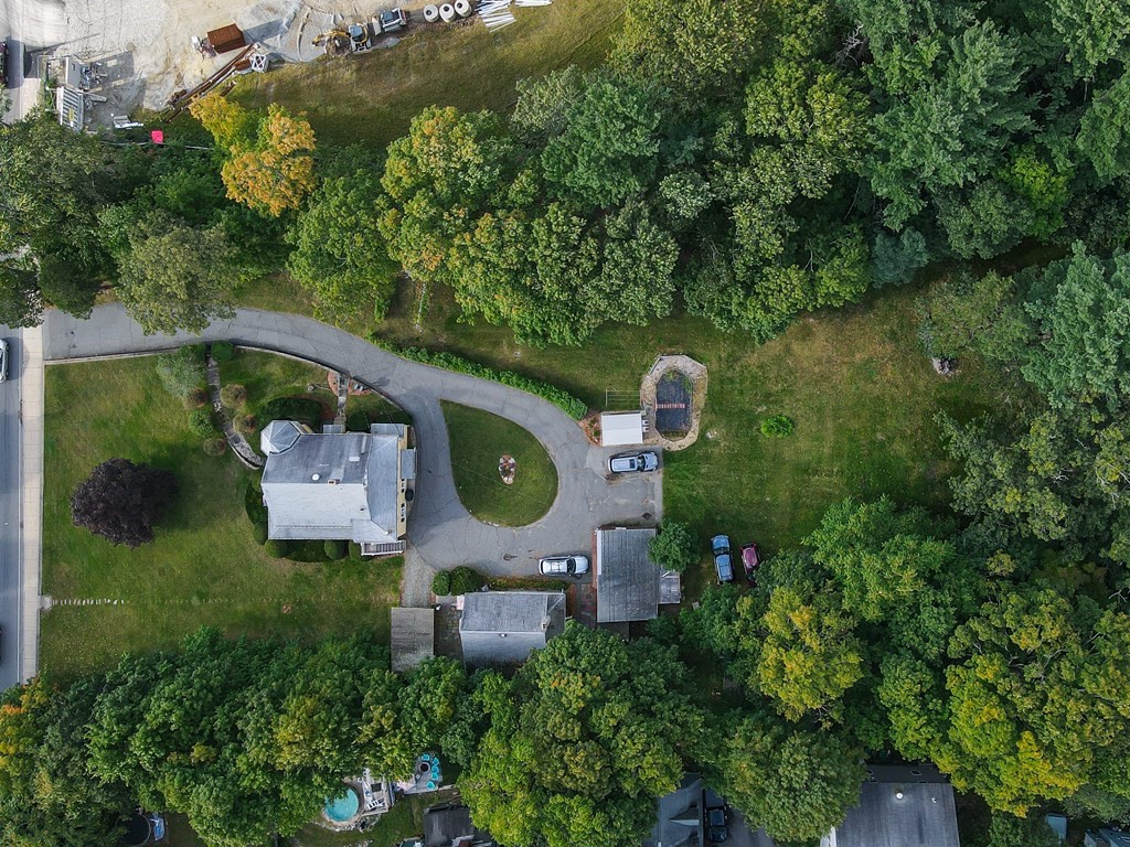 727 Main Street Woburn, MA 01801 - Photo 40 of 40 an aerial view of a house with backyard space and a lake view